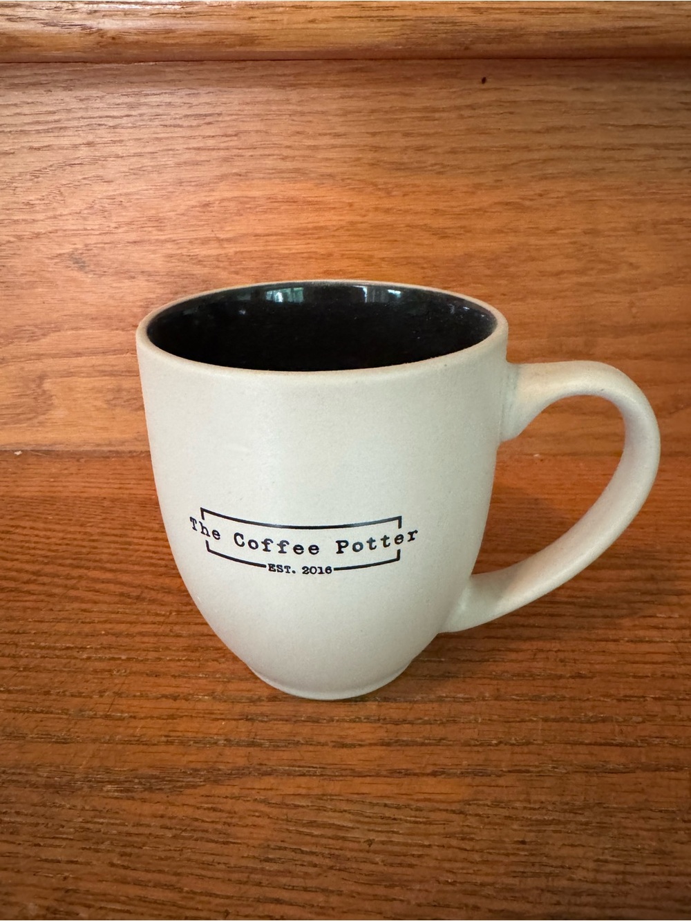 WELCOME TO HOPE: The Coffee Potter Cream Ceramic Coffee Mug with Black Interior